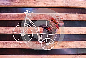 floral decoration, , decoration. Toy bike with basket