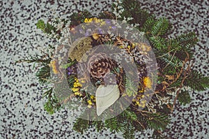 Floral decoration on grave during All Saints Day in the cemetery