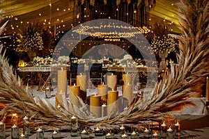 Floral decoration in wedding reception at night with candles