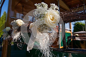 floral decoration with white roses in vintage style by the florist
