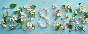 A floral depiction of the digit 8 presented against a backdrop of gentle blue hues