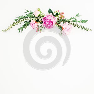Floral frame with pink peonies and roses flowers and eucalyptus on white background. Flat lay, top view