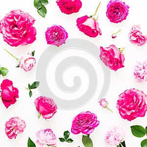 Floral frame with pink roses, petals and peonies on white background