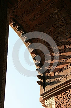 Floral and geometrical patterns were sculptured on the intrados of an arch at Qutb minar in New Delhi (India)