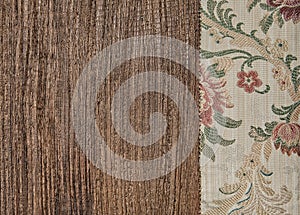 Floral green fabric on old wood background