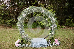 A floral and greenery hoop circle for Easter or spring decor outdoor decoration