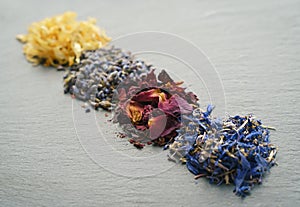 Floral herbs - dried marigold, lavender, rose and cornflower petals as ingredients for cooking