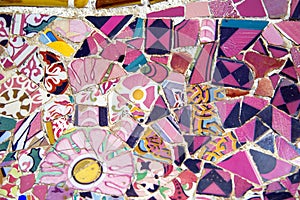 Floral mosaic in Park Guell, Barcelona, Spain photo