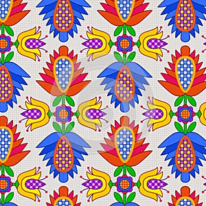 Floral ornament in folk style. Stylized flowers in rhombuses. Seamless patterns