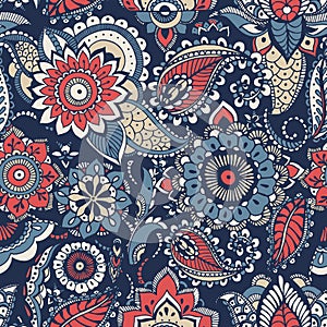 Floral paisley seamless pattern with colorful folk oriental motifs or mehndi elements on blue background. Motley