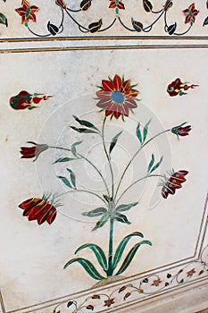 Floral Pietra dura (Parchin kami) work in the Taj Mahal, incorporating precious and semi-precious stones.