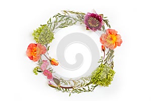 Floral round crown wreath with flowers and leaves. Flat lay, t