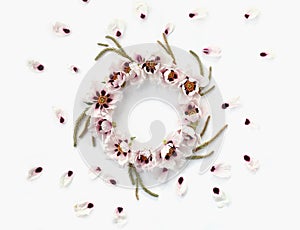 Floral round crown wreath with flowers and leaves.