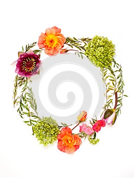 Floral round crown wreath with flowers and leaves.