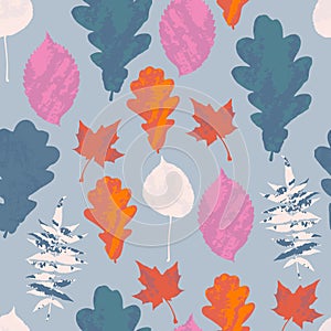 Floral seamless pattern with autumn grunge blue, red, orange, white, pink tree leaves on pastel blue background. Maple, Elm, Oak,