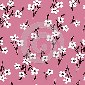 Floral seamless pattern. Pretty flowers on light pink background. Printing with small white flowers. Ditsy print