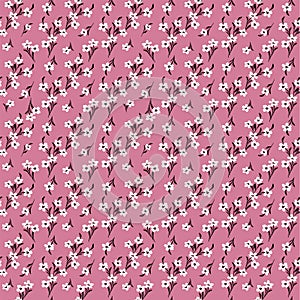Floral seamless pattern. Pretty flowers on light pink background. Printing with small white flowers. Ditsy print