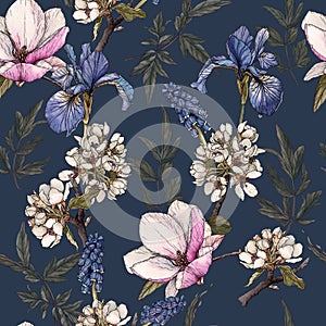 Floral seamless pattern with watercolor irises, magnolia, cherry blossom and muscari.