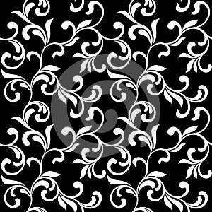 Floral seamless pattern. White swirls and foliage isolated on a black background.