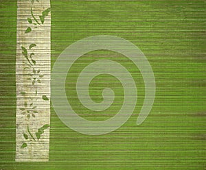 Floral white bamboo banner print on green wood