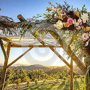 Floral wooden Chuppah of a Jewish wedding