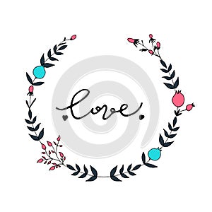 Floral wreath with love lettering. photo