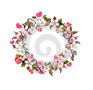 Floral wreath with pink flowers, feathers, hearts, keys. Watercolor circle frame for Valentine day, wedding