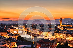 Florence Aerial View at Golden Sunset over Ponte Vecchio Bridge, Palazzo Vecchio and Cathedral of Santa Maria del Fiore with Duomo