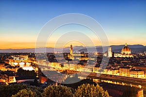 Florence Aerial View at Golden Sunset over Ponte Vecchio Bridge, Palazzo Vecchio and Cathedral of Santa Maria del Fiore with Duomo