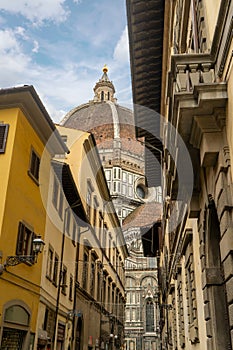 Florence Cathedral facade - Duomo di Firenze. Beautiful religious building with cloudy sky