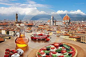 Florence cathedral with pizza in Italy photo