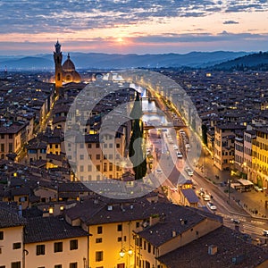 Florence city during golden sunset. Panoramic view to the river Arno, with Ponte Vecchio, Palazzo Vecchio