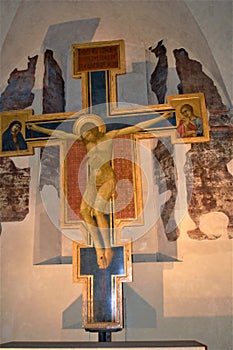 Florence city Italy cross with Jesus by Cimabue painter in cathedral Sanra Croce