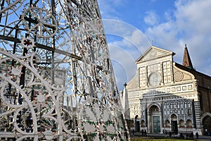 Florence, December 2018: Christmas tree in Piazza Santa Maria Novella at Florence. Christmas tree with the Basilica