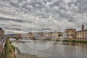 Florence or Firenze city view on Arno river, landscape with reflection. Tuscany, Italy