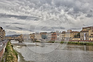 Florence or Firenze city view on Arno river, landscape with reflection. Tuscany, Italy