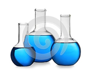 Florence flasks with blue liquid. Laboratory glassware