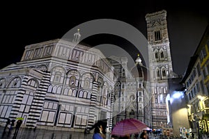 Florence, Italy: Dome of Santa Maria del Fiore and Battistero di San Giovanni, Piazza San Giovanni  in the night in city lights