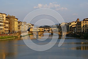 Florence, Italy: Santa Trinita bridge and Ponte Vecchio bridge in the background