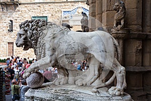 Florence, ITALY- September 10, 2016: Marble statue of Lion at Loggia Dei Lanzi in front of Palazzo Vecchio