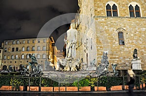 FLORENCE-NOVEMBER 11:Fountain of Neptune on Piazza della Signoria at night on November 11,2010 in Florence,Italy.