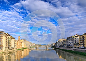 Florence skyline from the Ponte Vecchio over the Arno River: in the background the Santa Trinità Bridge.