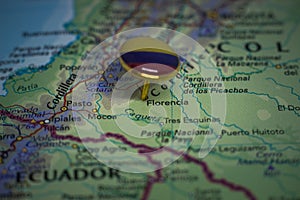 Florencia pinned on a map with the flag of Colombia photo