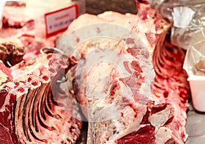 Florentine steak at a market butcher stand in Florence, Italy