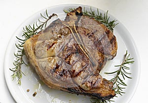 Florentine steak on the table photo