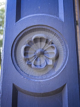 Floret architectural detail of building.