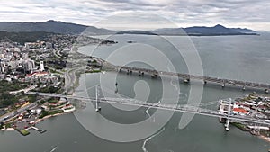 Florianopolis Capital Of Santa Catarina at Brazil. Aerial image taken with a drone of the Hercilio Luz Bridge during sunrise.