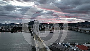 Florianopolis Capital Of Santa Catarina at Brazil. Aerial image taken with a drone of the Hercilio Luz Bridge during sunrise.