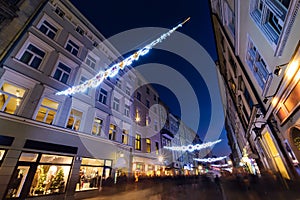 Florianska street in the centre of Krakow, decorated by the christmas lights. photo