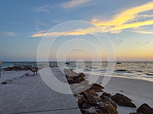 Florida beach sunset boardwalk rocks sand colors